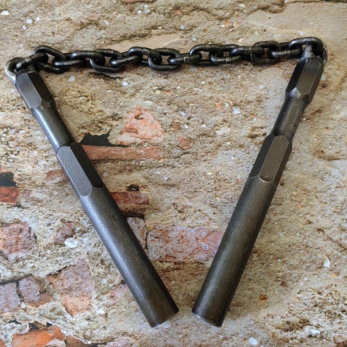 Reinforced Double Baton in Hard Black Spring Steel