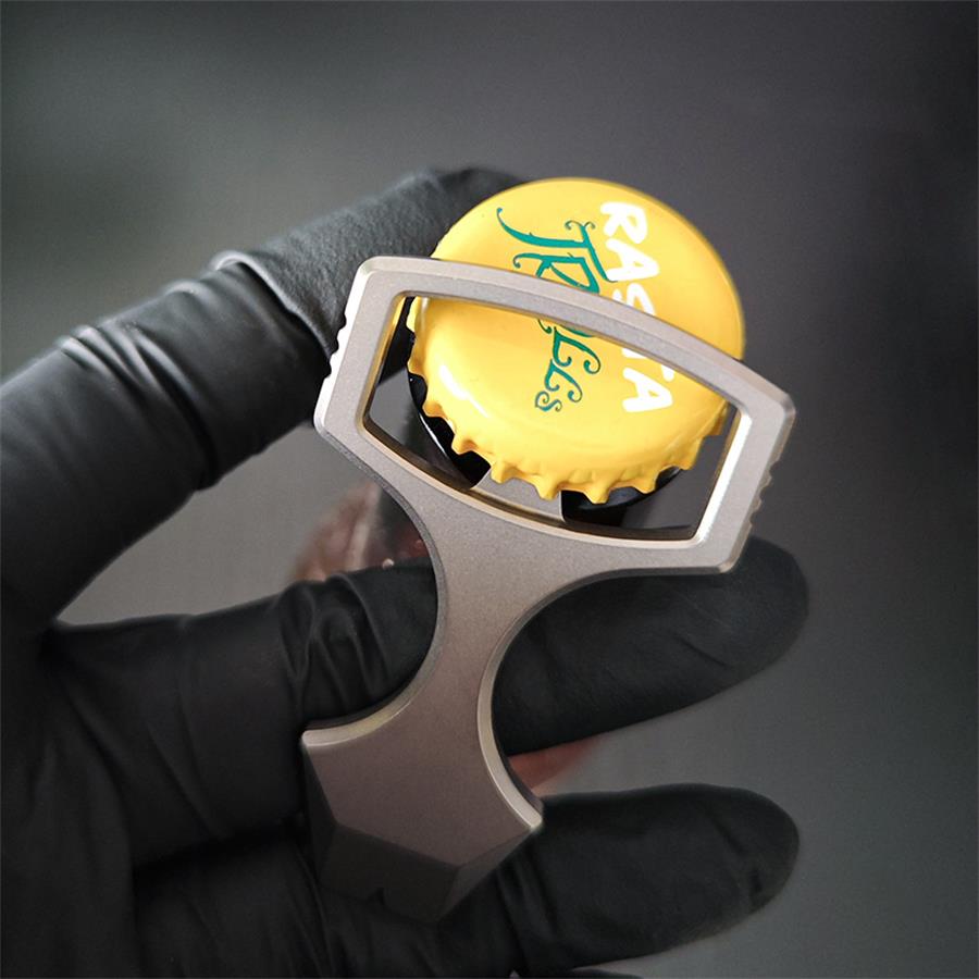 Handheld Crowbar-Style Bottle Opener and Emergency Glass Breaking Tool