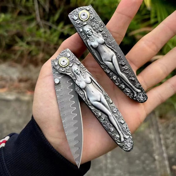 Vintage Handle Folding Knife Featuring a Damascus Steel Blade