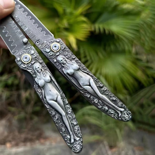 Vintage Handle Folding Knife Featuring a Damascus Steel Blade