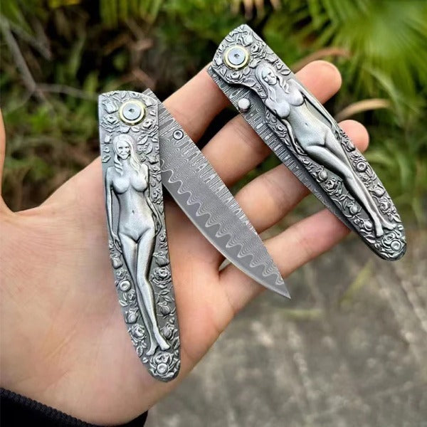 Vintage Handle Folding Knife Featuring a Damascus Steel Blade