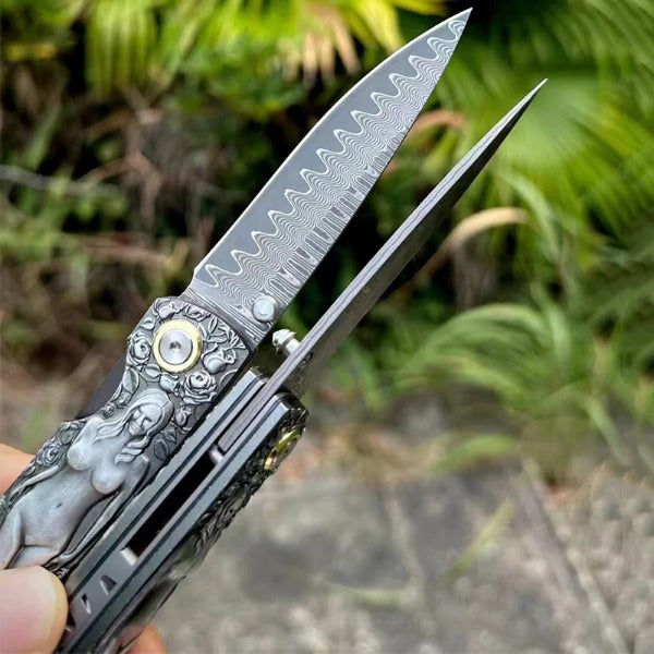 Vintage Handle Folding Knife Featuring a Damascus Steel Blade
