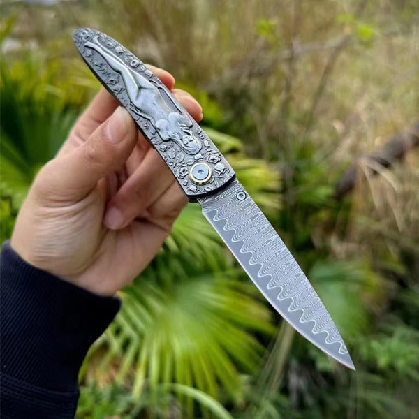 Vintage Handle Folding Knife Featuring a Damascus Steel Blade