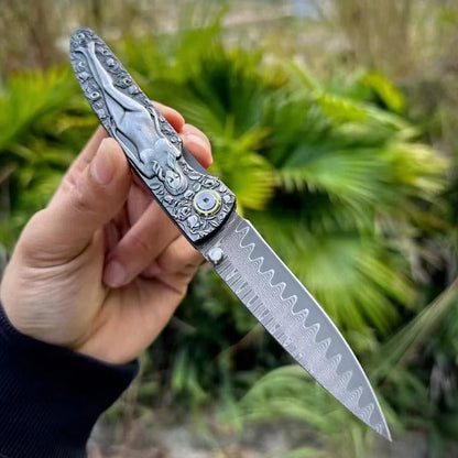 Vintage Handle Folding Knife Featuring a Damascus Steel Blade